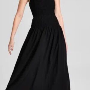 Black Smocked Maxi Dress with Flowing Skirt